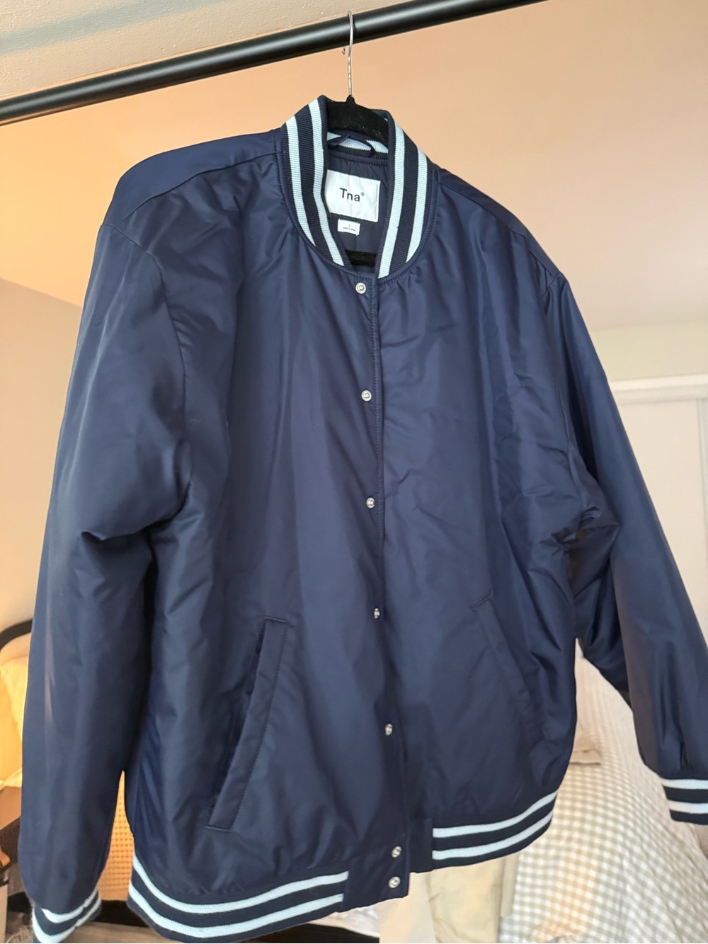TNA navy and white stadium jacket
